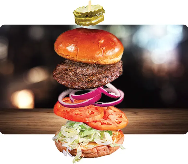 A hamburger being put together