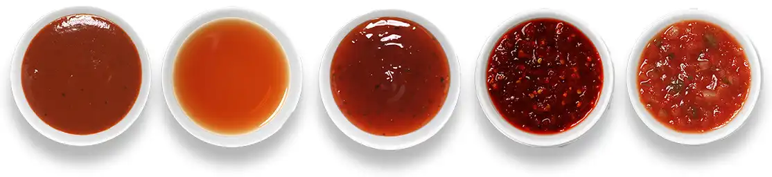 Wing sauces in bowls