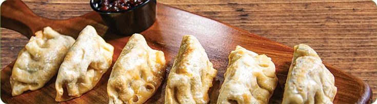 A row of potstickers