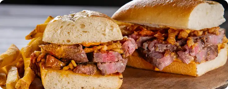 Two ribeye steak sandwiches